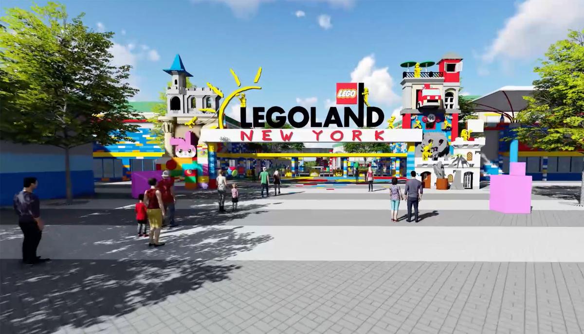 Animated image of LEGOLAND New York opening gate made of colourful LEGO with people walking in