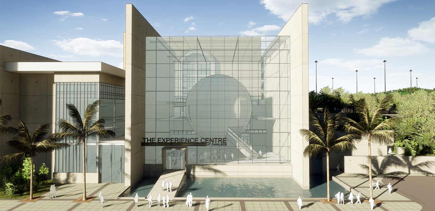 Render of Mira Flores Visitor Experience Exterior white building with bridge over pond to entrance