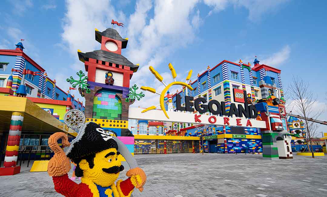 Legoland Korea opening gates made of lego with lego pirate in the foreground