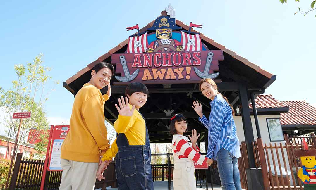 Family at the Anchors Away ride gate at Legoland Korea